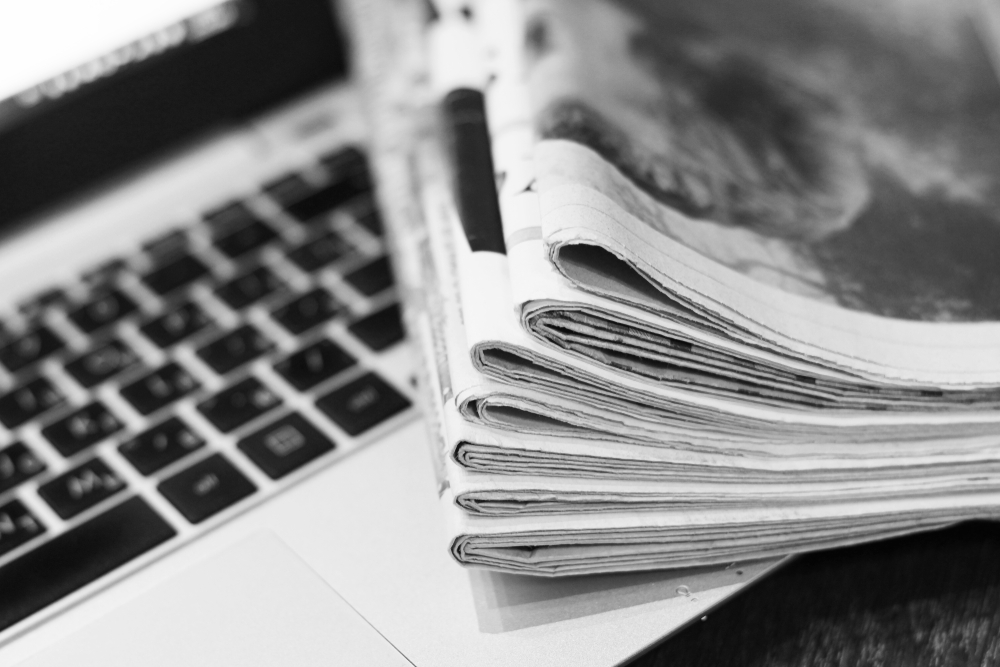 Newspapers,And,Laptop.,Pile,Of,Daily,Papers,With,News,On