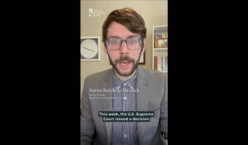 A screenshot of a video featuring Aaron Reichlin-Melnick talking about the Supreme Court's recent ruling on immigration raids